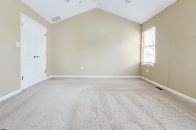 a kitchen with stainless steel appliances a refrigerator and a sink
