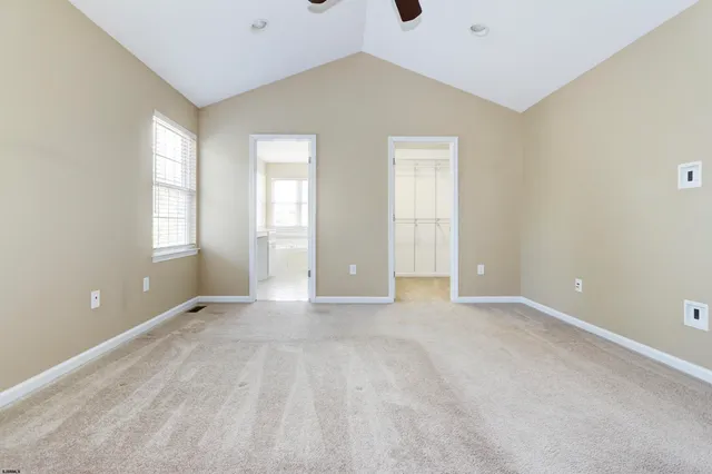 a bathroom with a sink toilet and mirror
