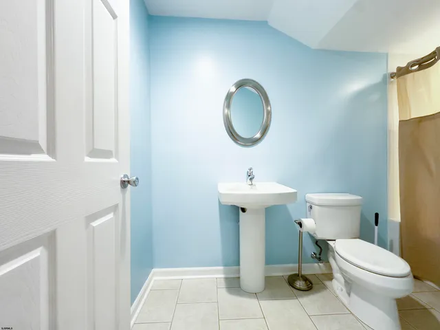 an aerial view of a house with a swimming pool