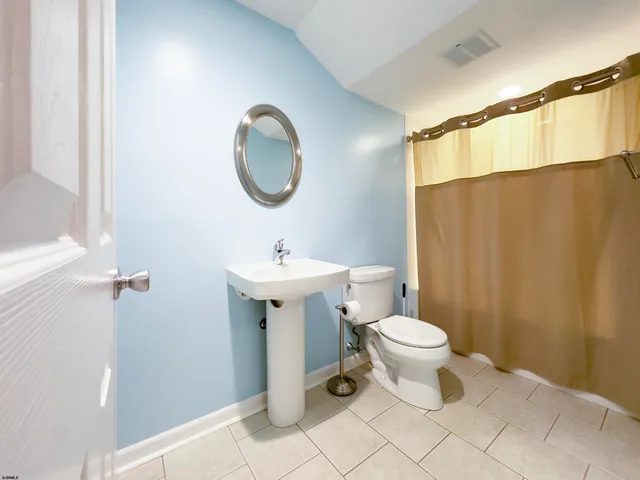 an aerial view of houses with outdoor space