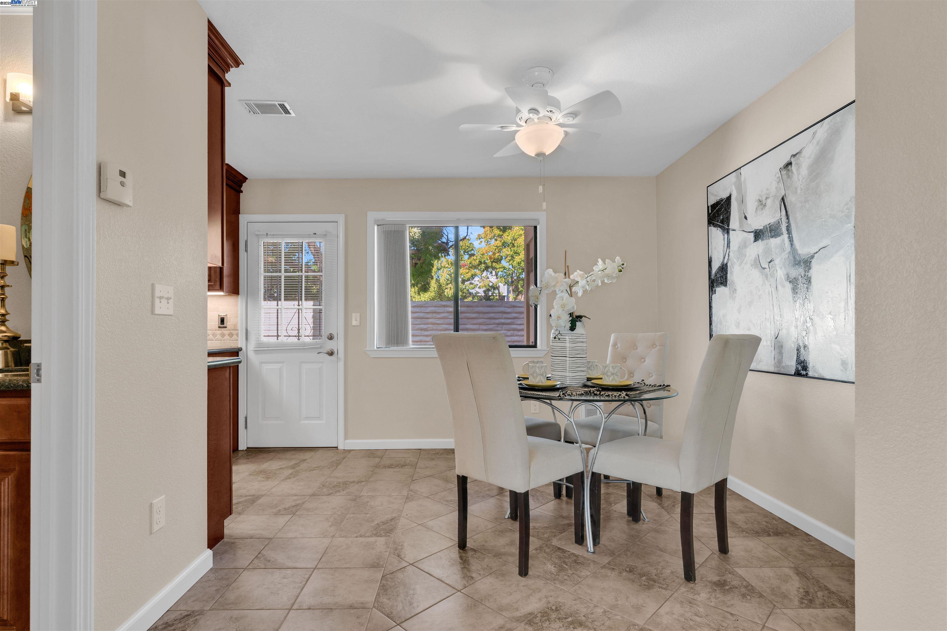 7602 Arbor Creek Circle Dublin, CA 94568 - Photo 11 of 47 a view of a dining room with furniture