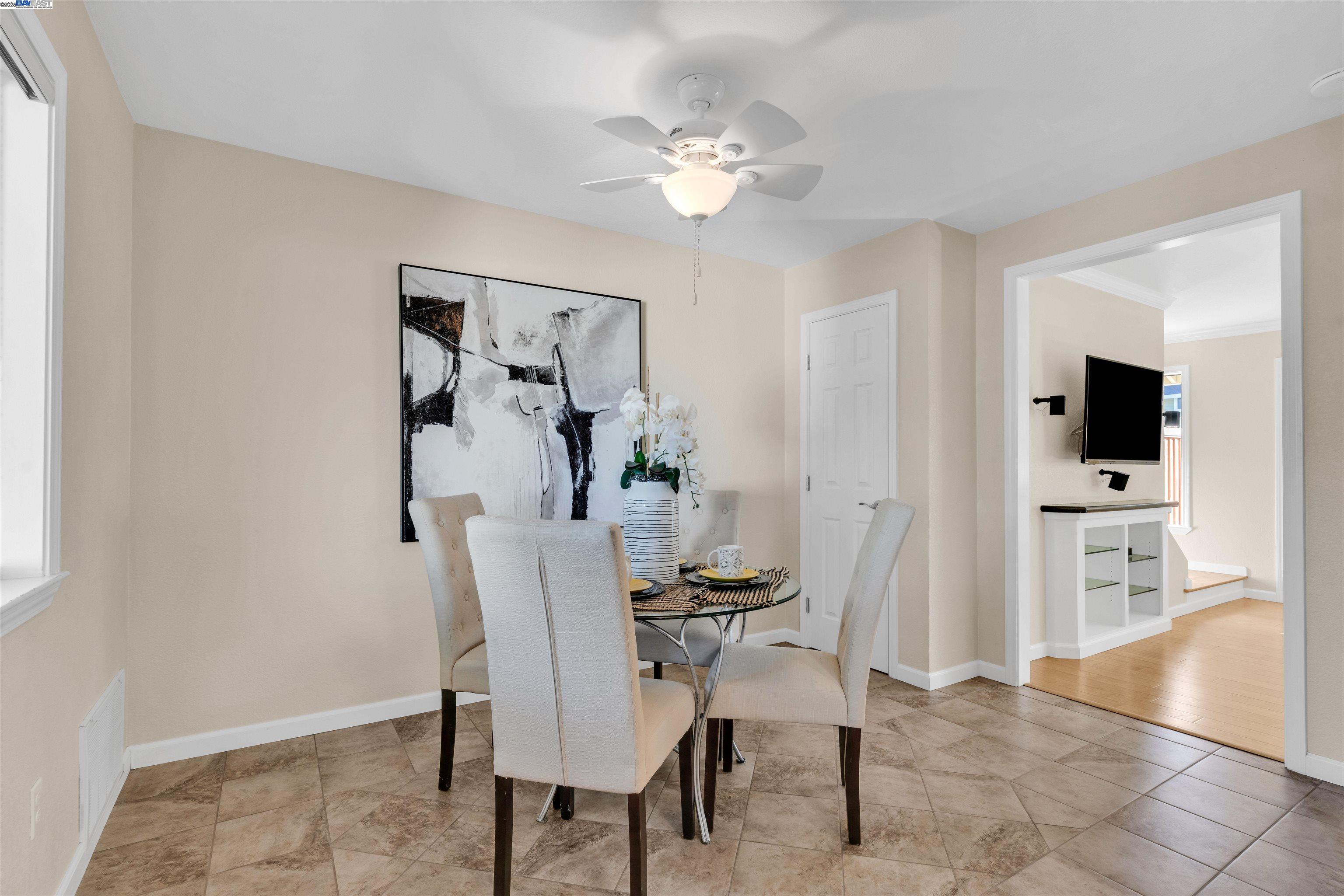 7602 Arbor Creek Circle Dublin, CA 94568 - Photo 13 of 47 a view of a dining room with furniture and wooden floor