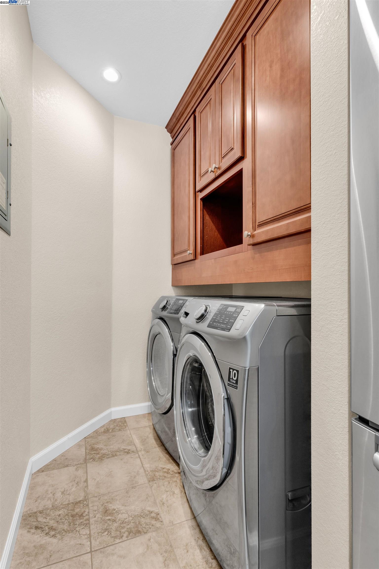 7602 Arbor Creek Circle Dublin, CA 94568 - Photo 20 of 47 a utility room with dryer and washer