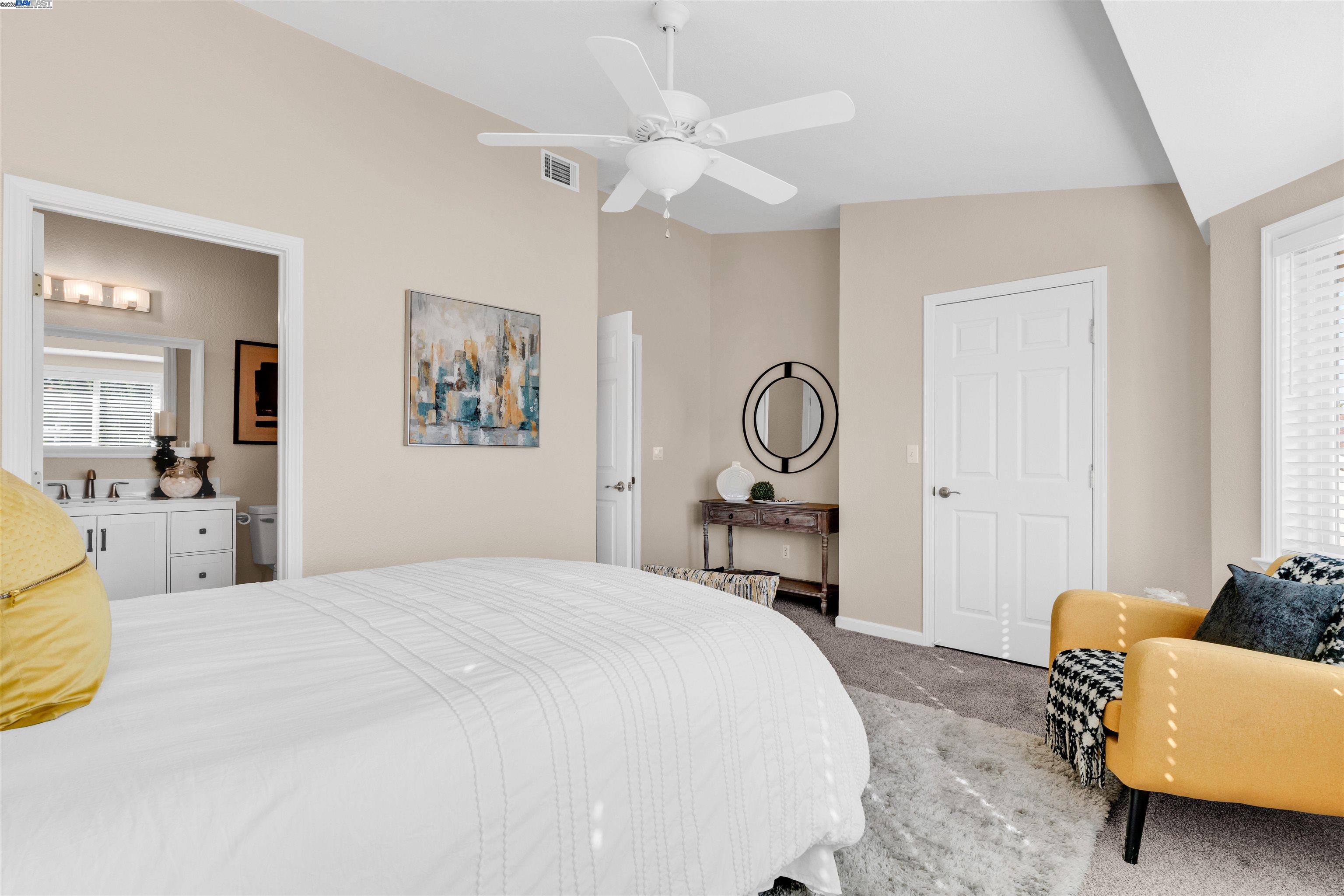 7602 Arbor Creek Circle Dublin, CA 94568 - Photo 26 of 47 a bedroom with a bed a couch and dresser