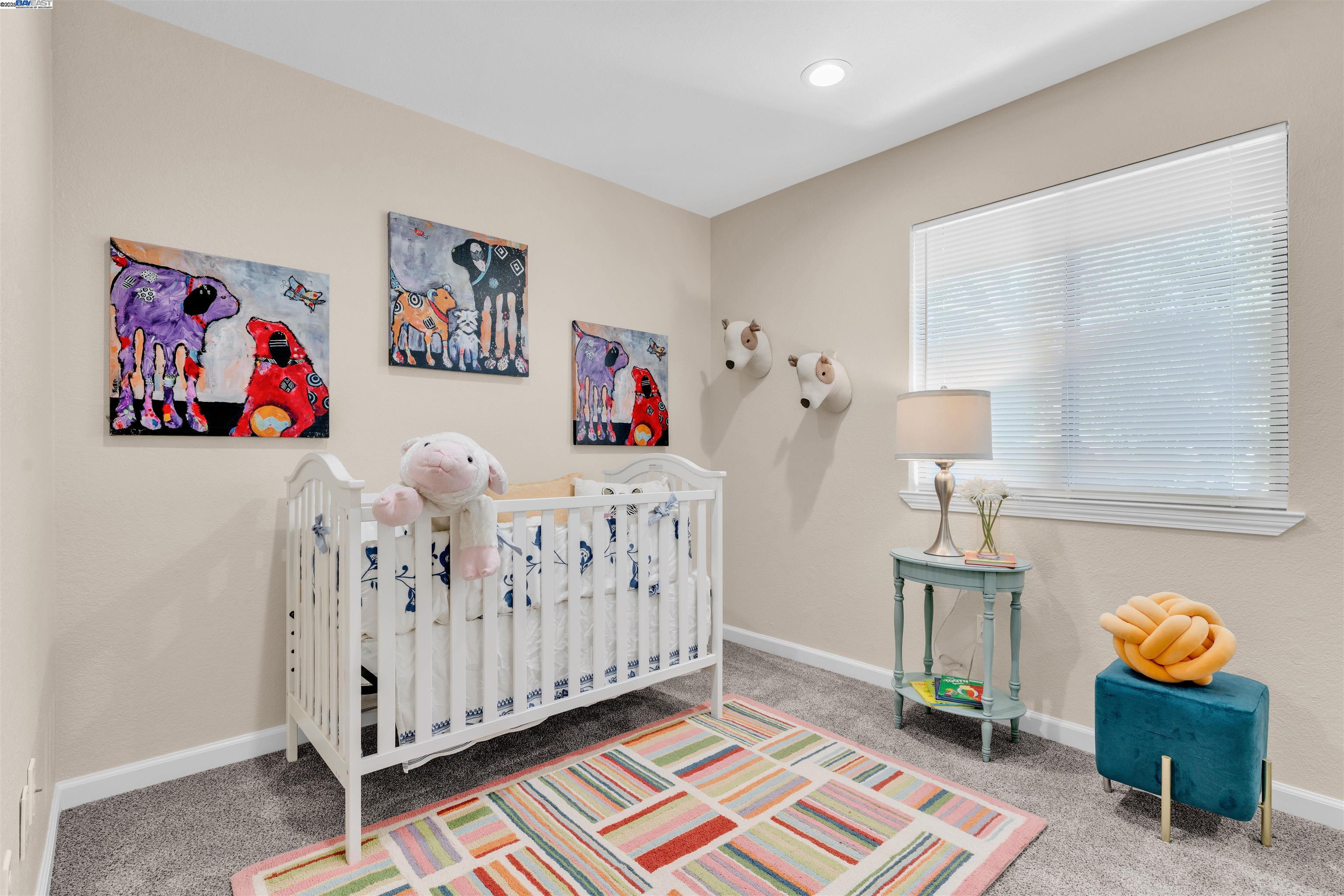 7602 Arbor Creek Circle Dublin, CA 94568 - Photo 33 of 47 a bedroom with furniture and paintings on the wall