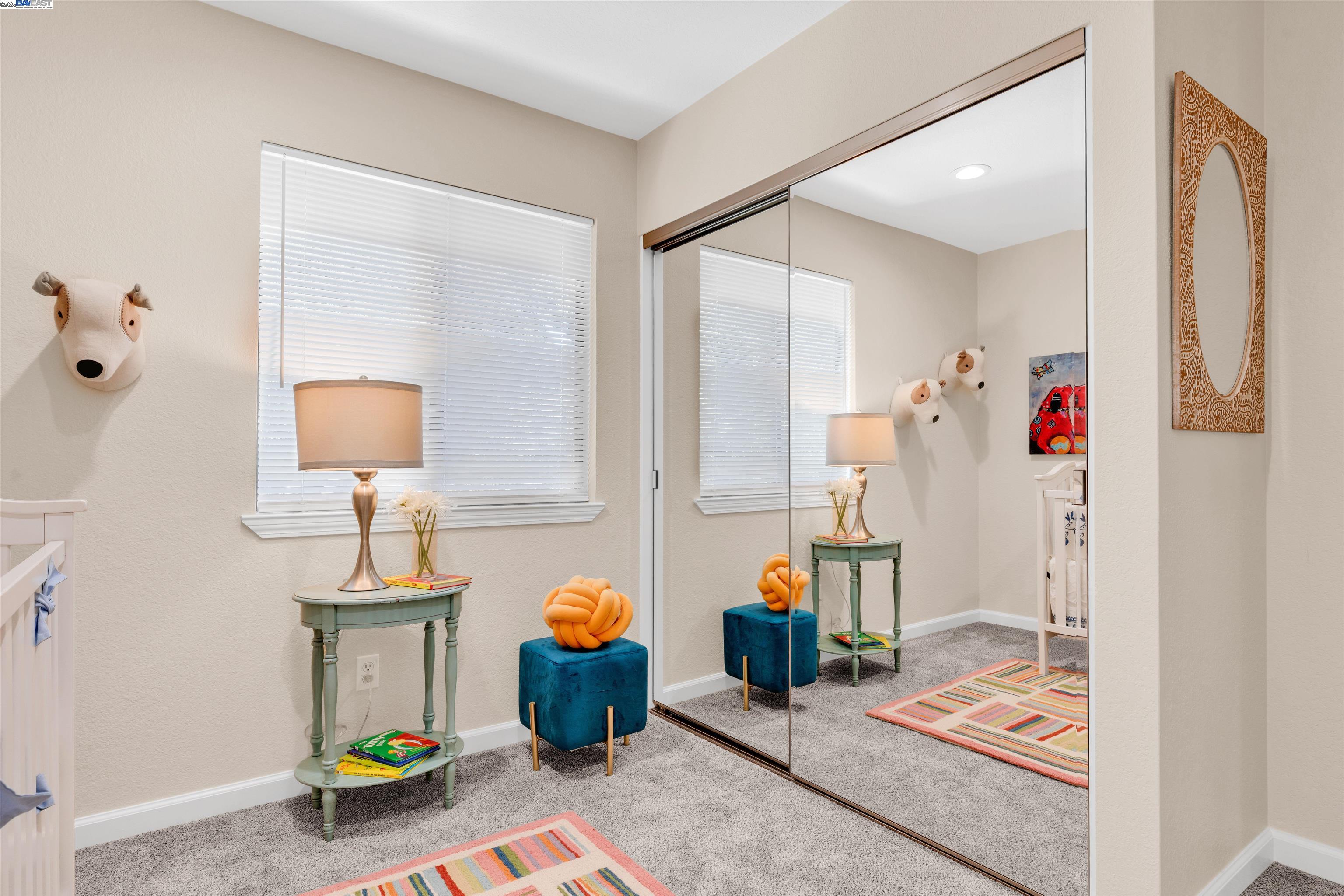 7602 Arbor Creek Circle Dublin, CA 94568 - Photo 34 of 47 a very nice looking room with a mirror