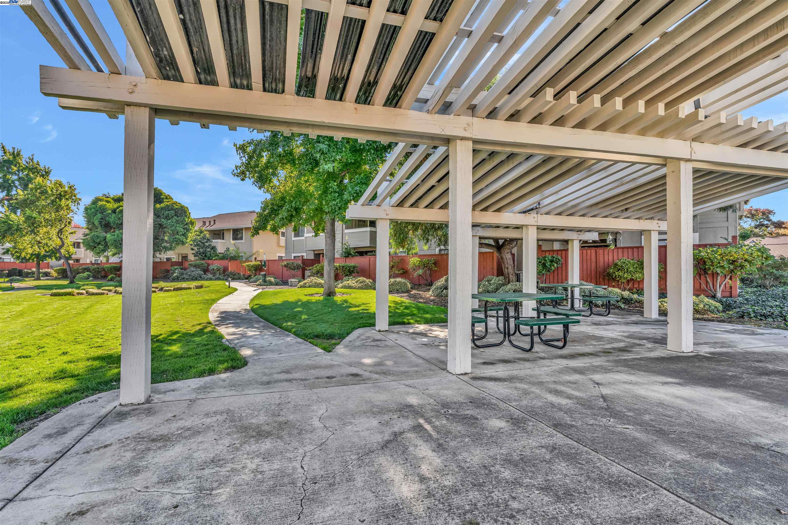 7602 Arbor Creek Circle Dublin, CA 94568 - Photo 39 of 47 a view of a porch with a garden