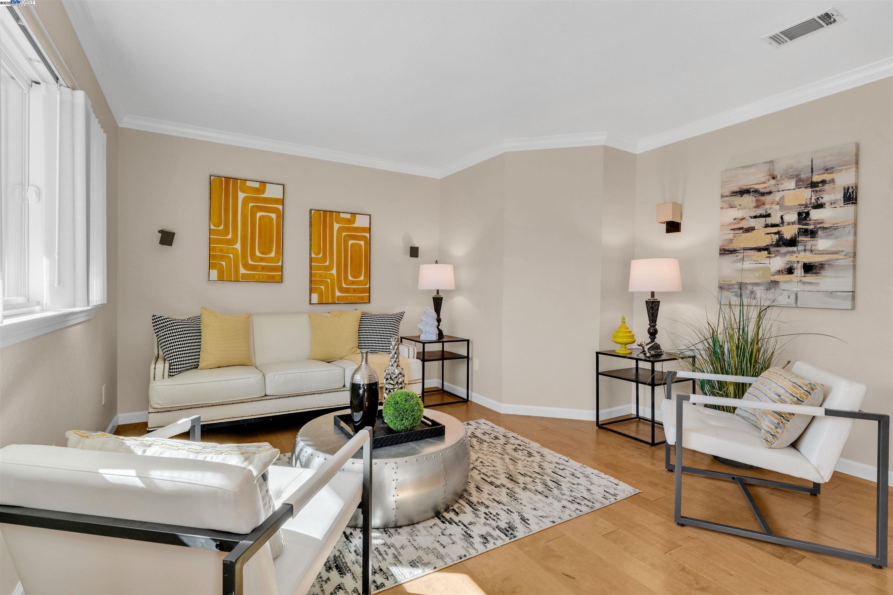 7602 Arbor Creek Circle Dublin, CA 94568 - Photo 7 of 47 a living room with furniture and wooden floor