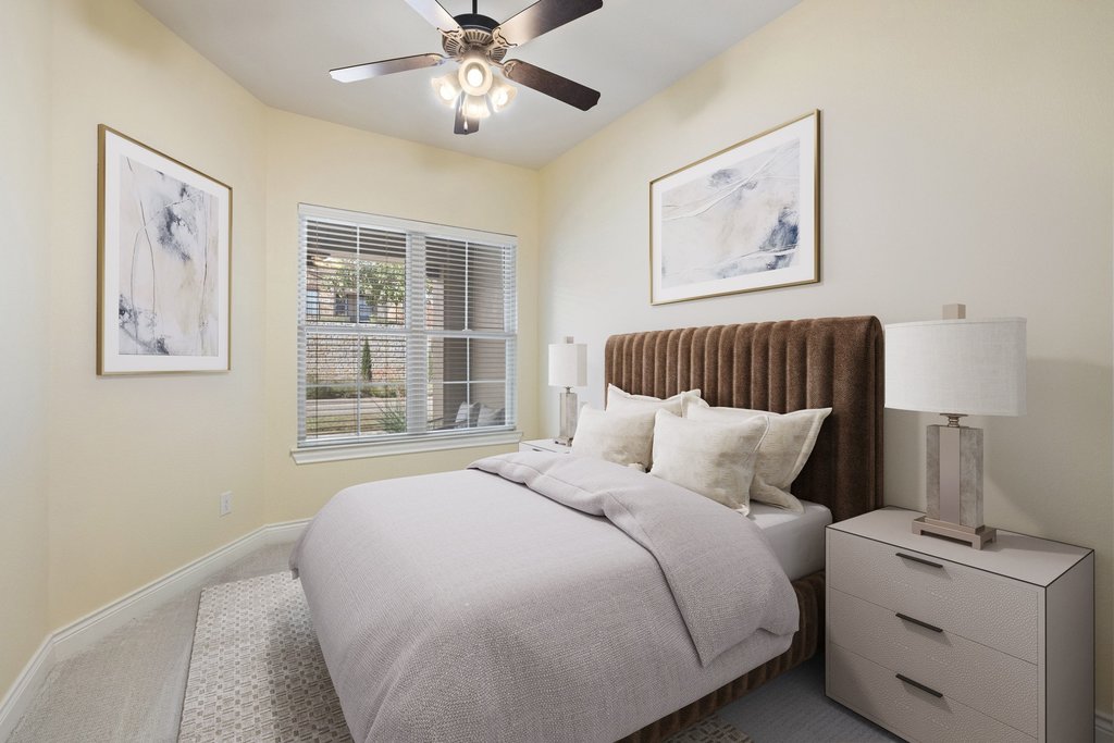 108-2 Rivalto Circle, Unit 2 Lakeway, TX 78734 - Photo 15 of 21 a bedroom with a large bed and a window