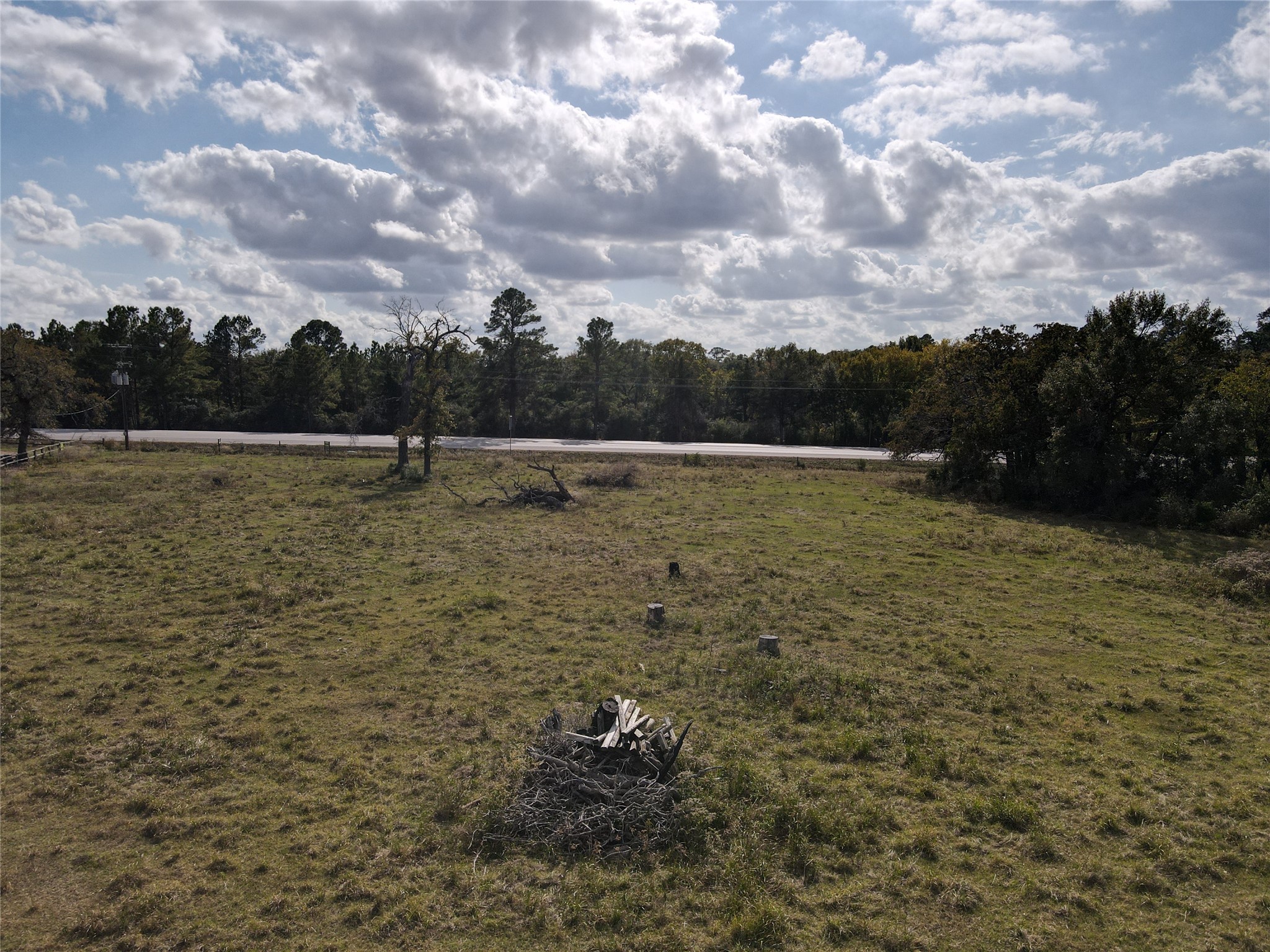 290 Bus Hempstead Tx 77445 Hempstead, TX 77445 - Photo 9 of 9 a view of a field with an trees in the background