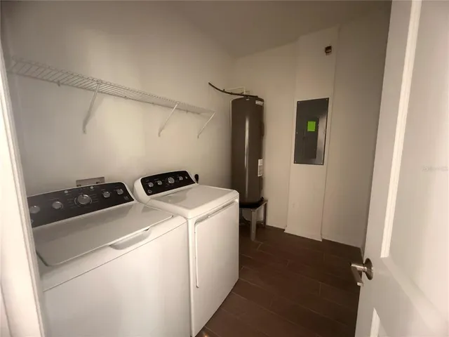 a utility room with dryer and washer