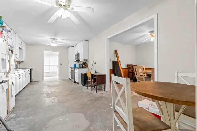 a view of a livingroom with furniture and a livingroom