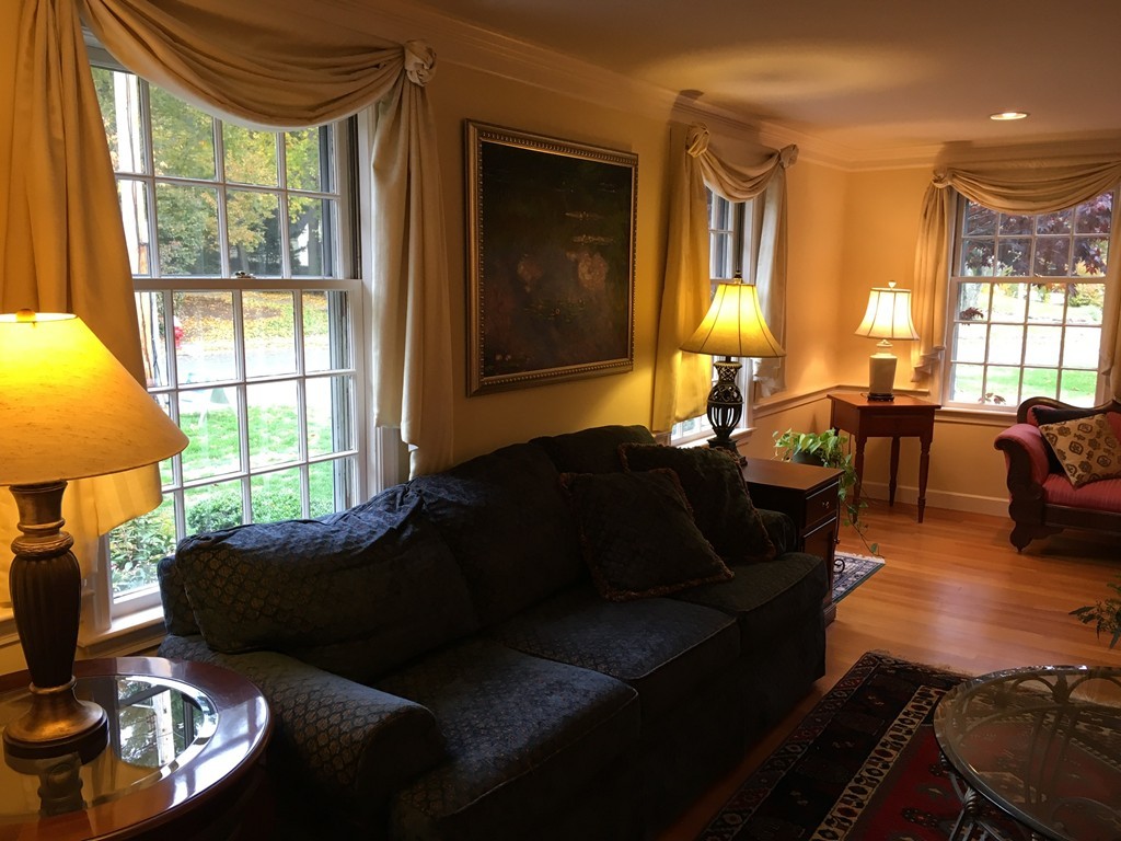 14 Windemere Road Wellesley, MA 02481 - Photo 4 of 25 a living room with furniture and a large window