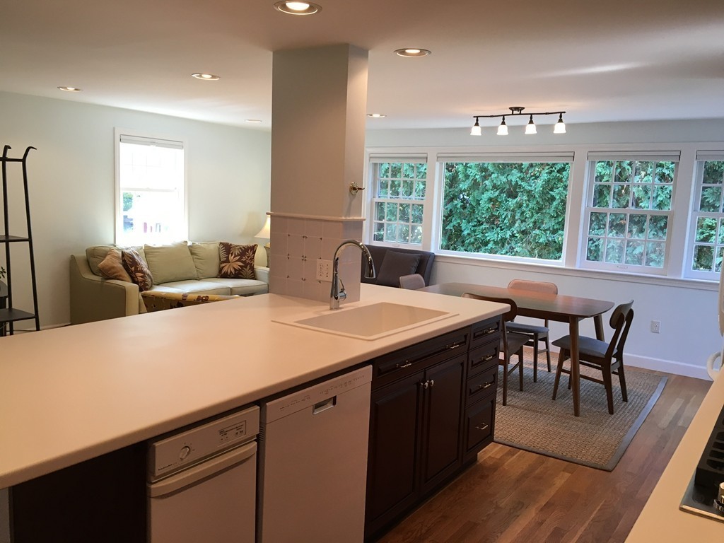 14 Windemere Road Wellesley, MA 02481 - Photo 8 of 25 a view of a dining room with furniture window and outside view