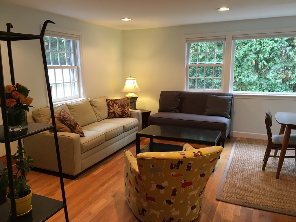 14 Windemere Road Wellesley, MA 02481 - Photo 9 of 25 a living room with furniture and a large window