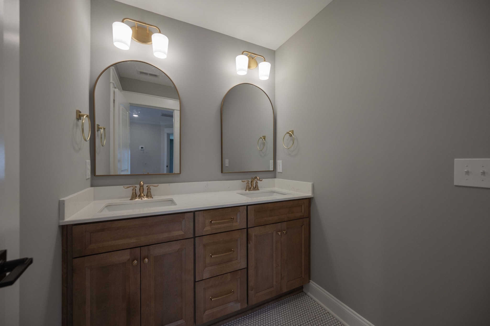 0 Linwood Road Watertown, TN 37184 - Photo 42 of 48 a bathroom with double vanity sinks and a mirror