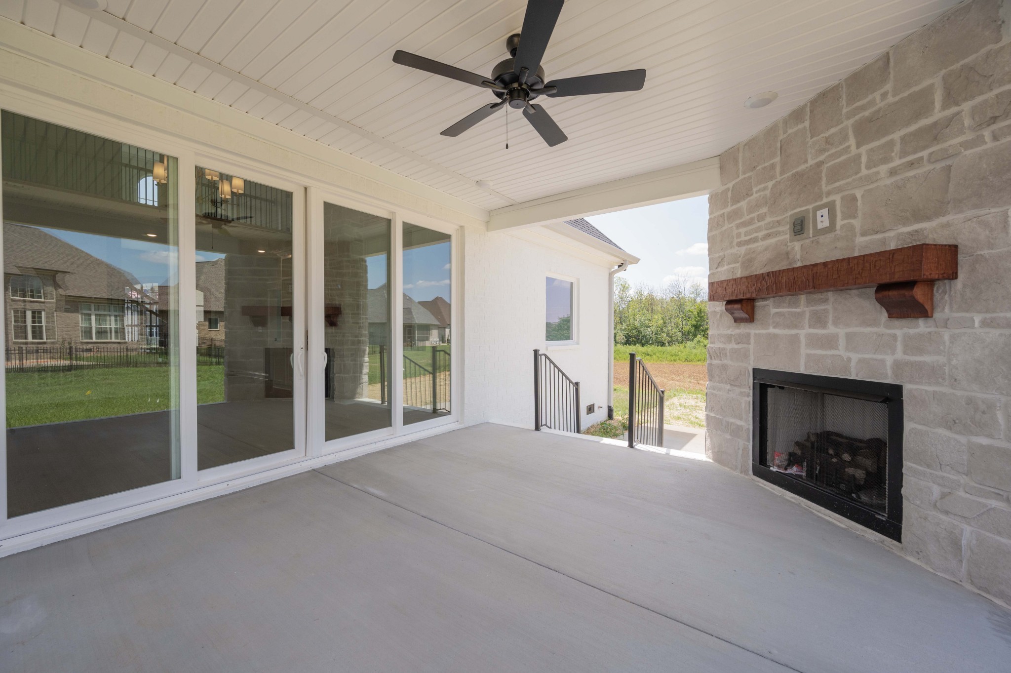 0 Linwood Road Watertown, TN 37184 - Photo 48 of 48 a bed room with a fireplace and a floor to ceiling window