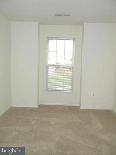 1 Puller Place Stafford, VA 22556 - Photo 9 of 17 an empty room with a window