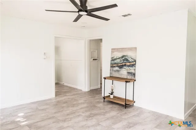 a view of a hallway with elevator