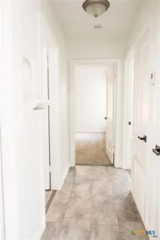 a view of a room with an empty space