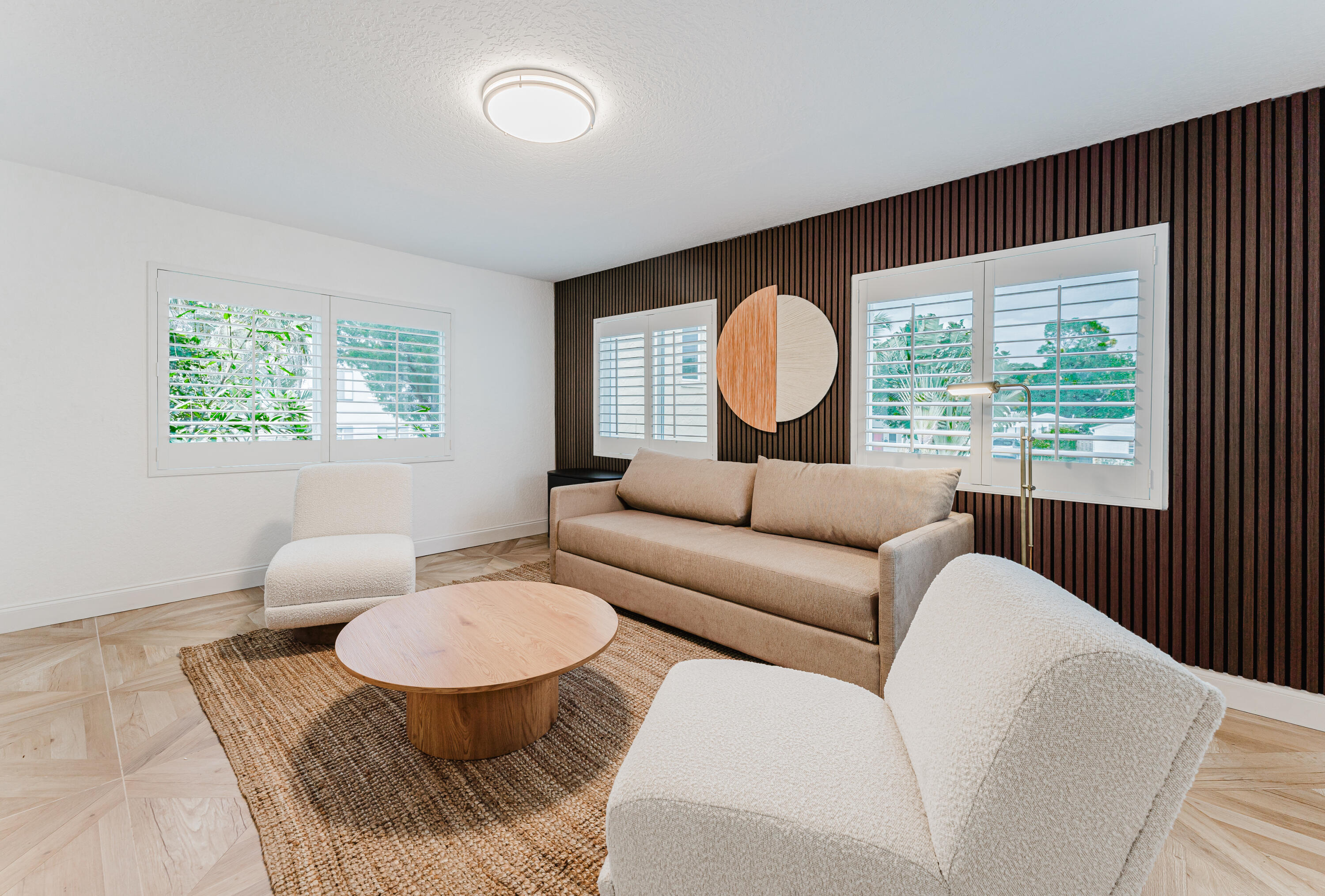 921 Ortega Road West Palm Beach, FL 33405 - Photo 37 of 60 a living room with furniture and a large window
