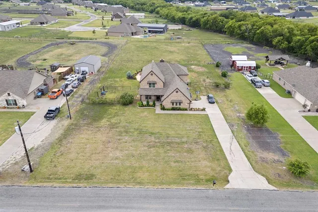 swimming pool view with a lake view