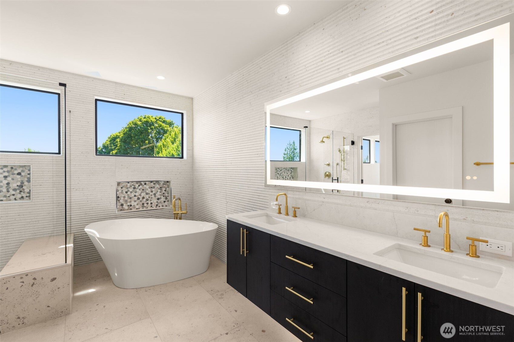 6833 36th Avenue Northeast Seattle, WA 98115 - Photo 18 of 40 a spacious bathroom with a double vanity sink mirror and bathtub