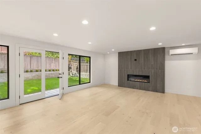 a kitchen with kitchen island a sink stainless steel appliances and cabinets