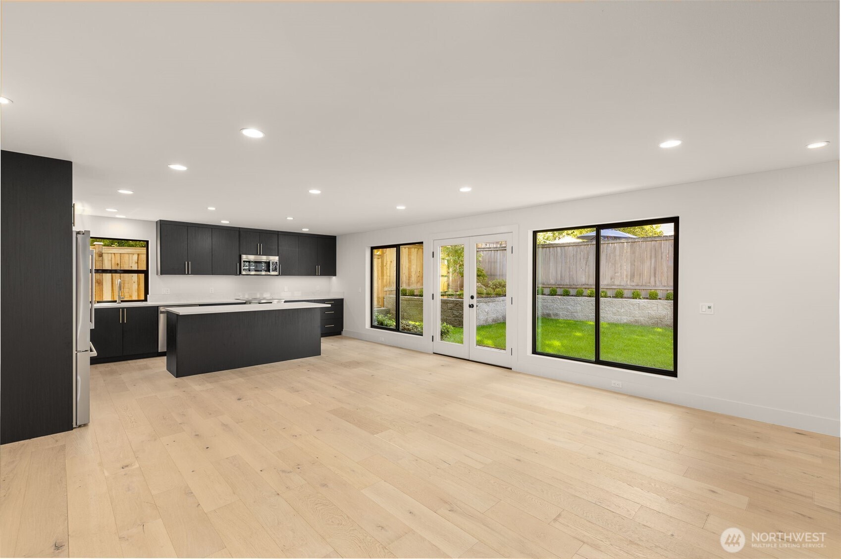 6833 36th Avenue Northeast Seattle, WA 98115 - Photo 26 of 40 a large white room with a large window