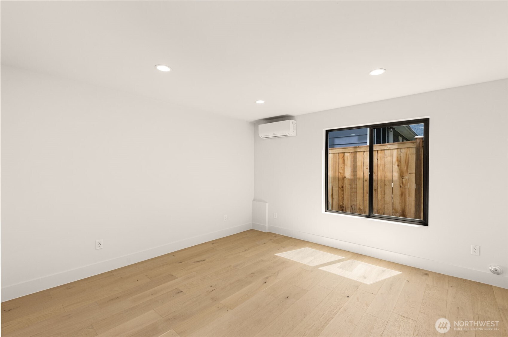 6833 36th Avenue Northeast Seattle, WA 98115 - Photo 27 of 40 an empty room with a window
