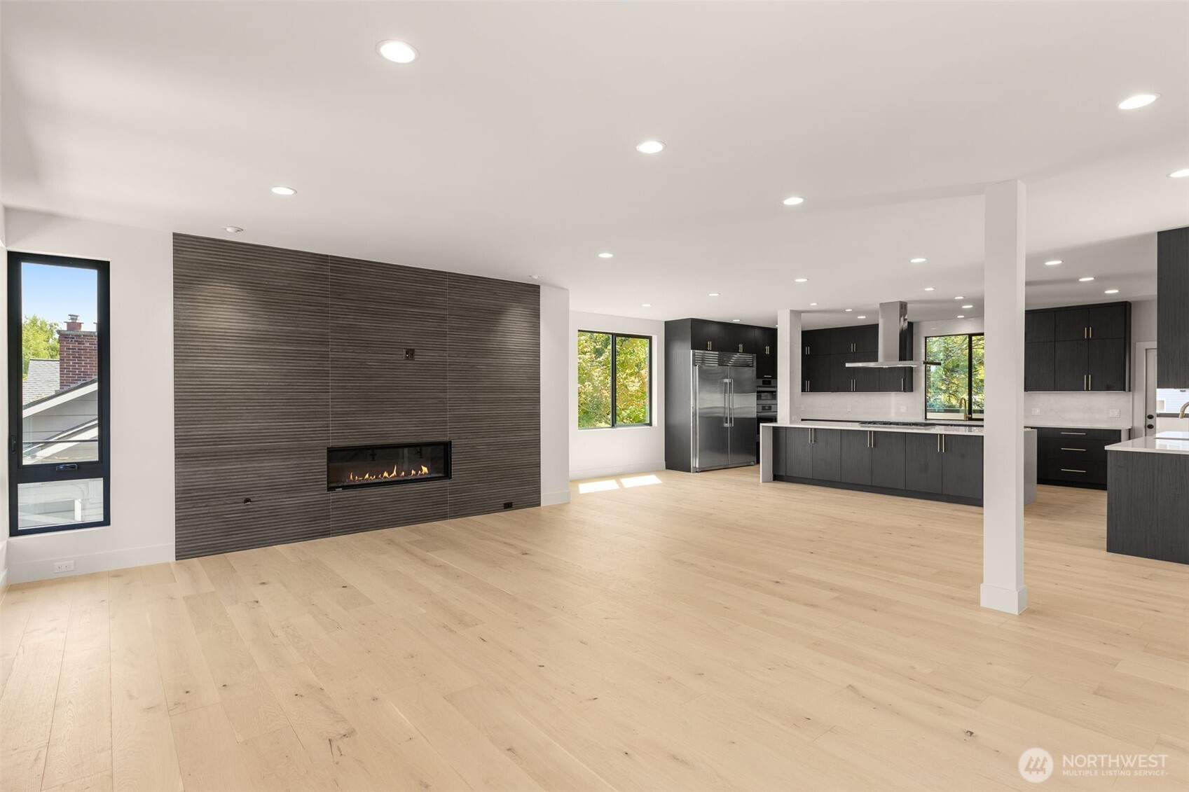 6833 36th Avenue Northeast Seattle, WA 98115 - Photo 3 of 40 a view of kitchen with furniture and a fireplace