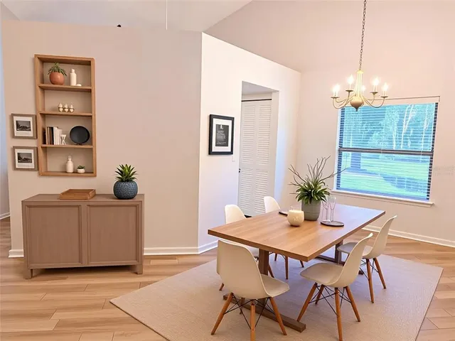 a dining room with furniture and window