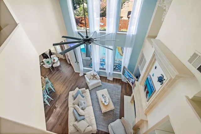 a bathroom with a tub sink shower and mirror