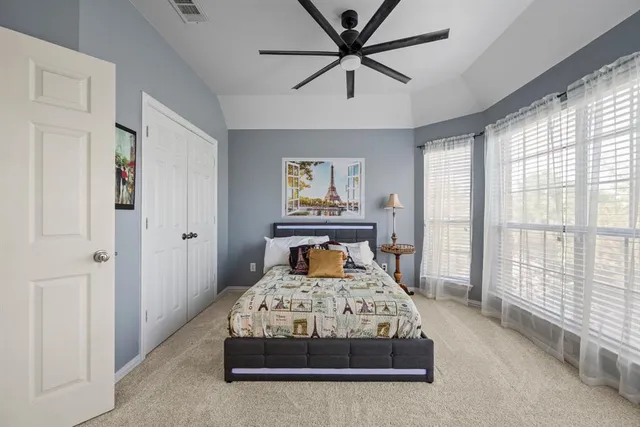 a view of a swimming pool with a lounge chairs