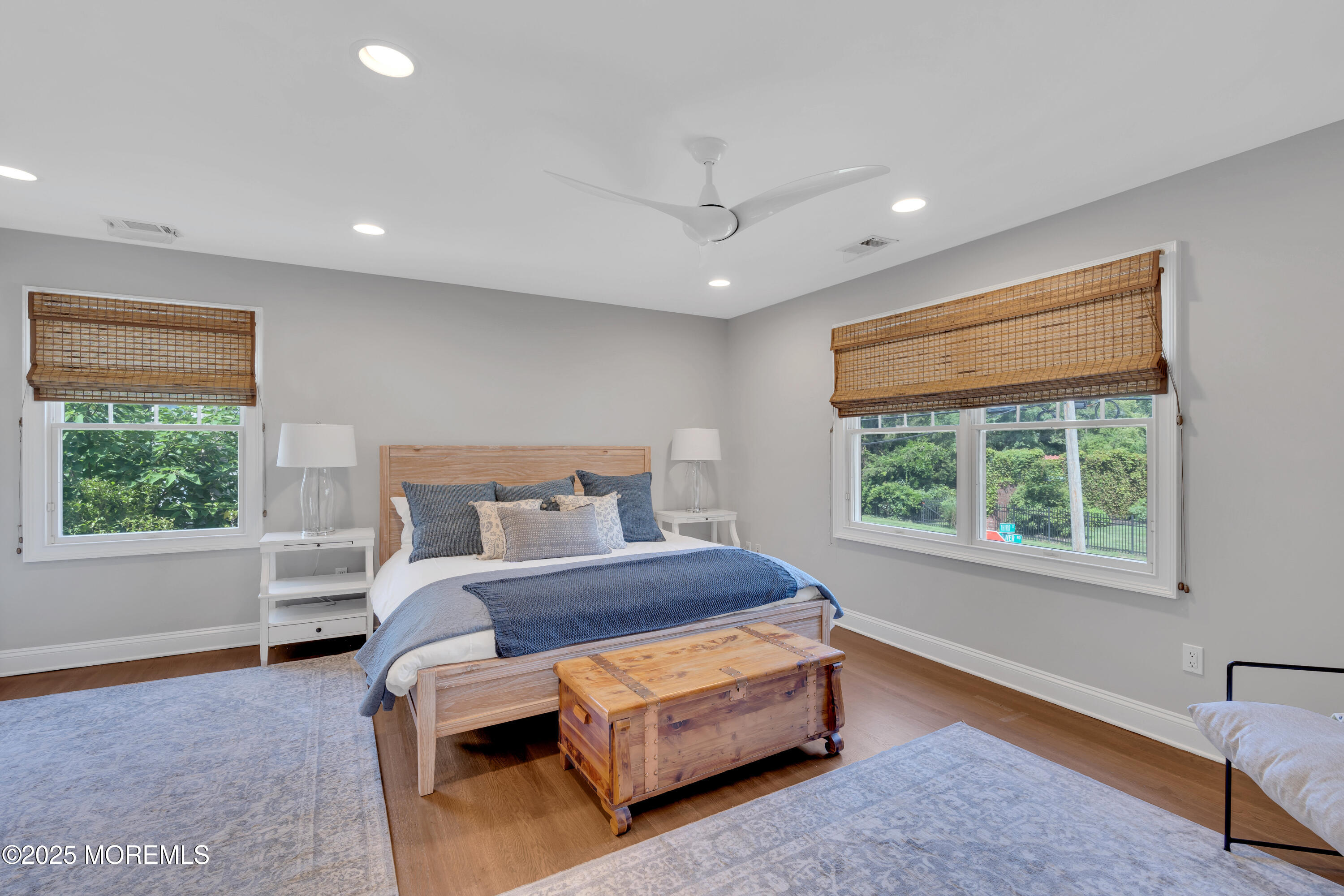57 River Road Rumson, NJ 07760 - Photo 12 of 44 a bedroom with a bed and a window