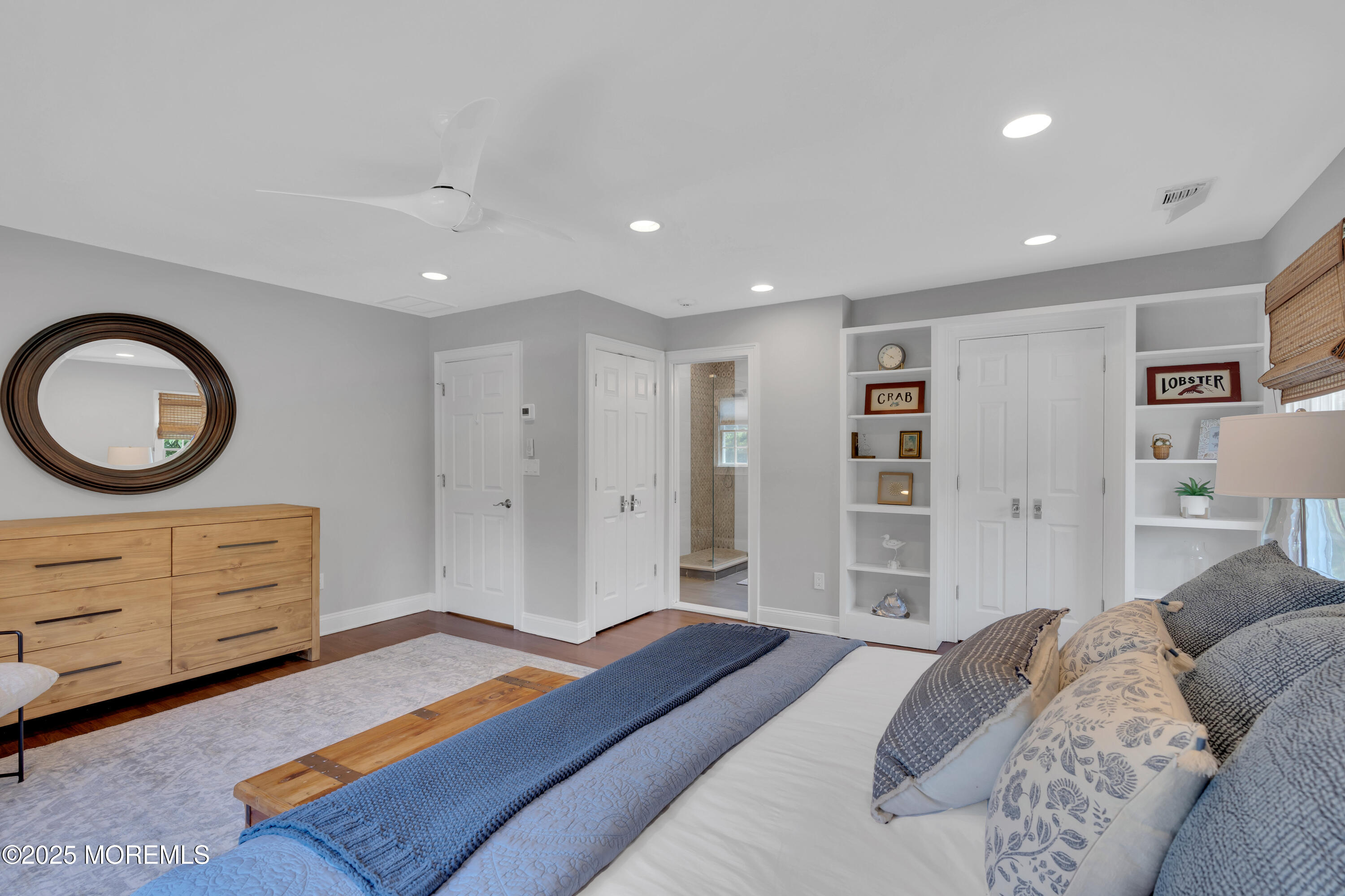 57 River Road Rumson, NJ 07760 - Photo 14 of 44 a bedroom with a bed and a cabinets