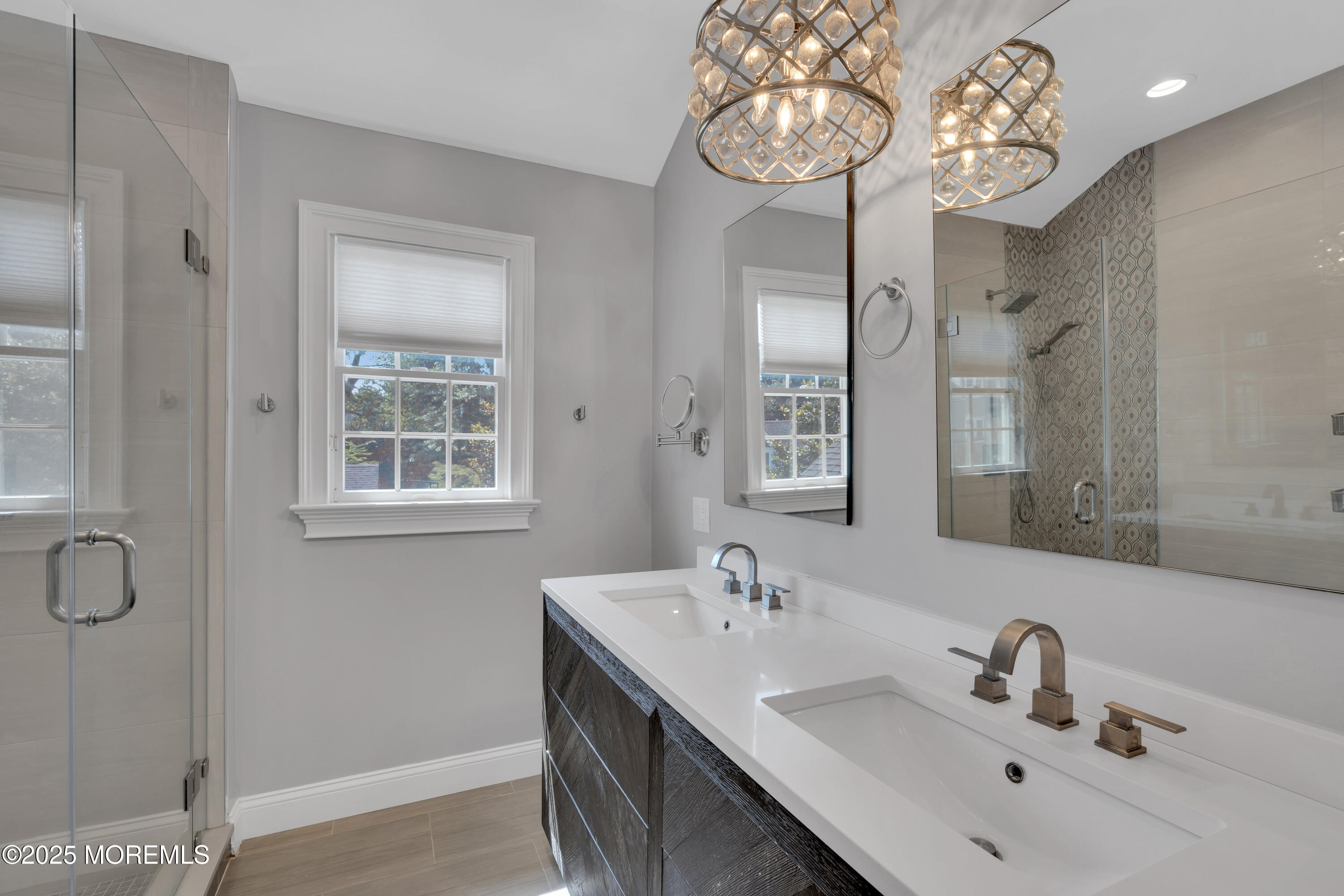 57 River Road Rumson, NJ 07760 - Photo 16 of 44 a bathroom with a sink and a mirror