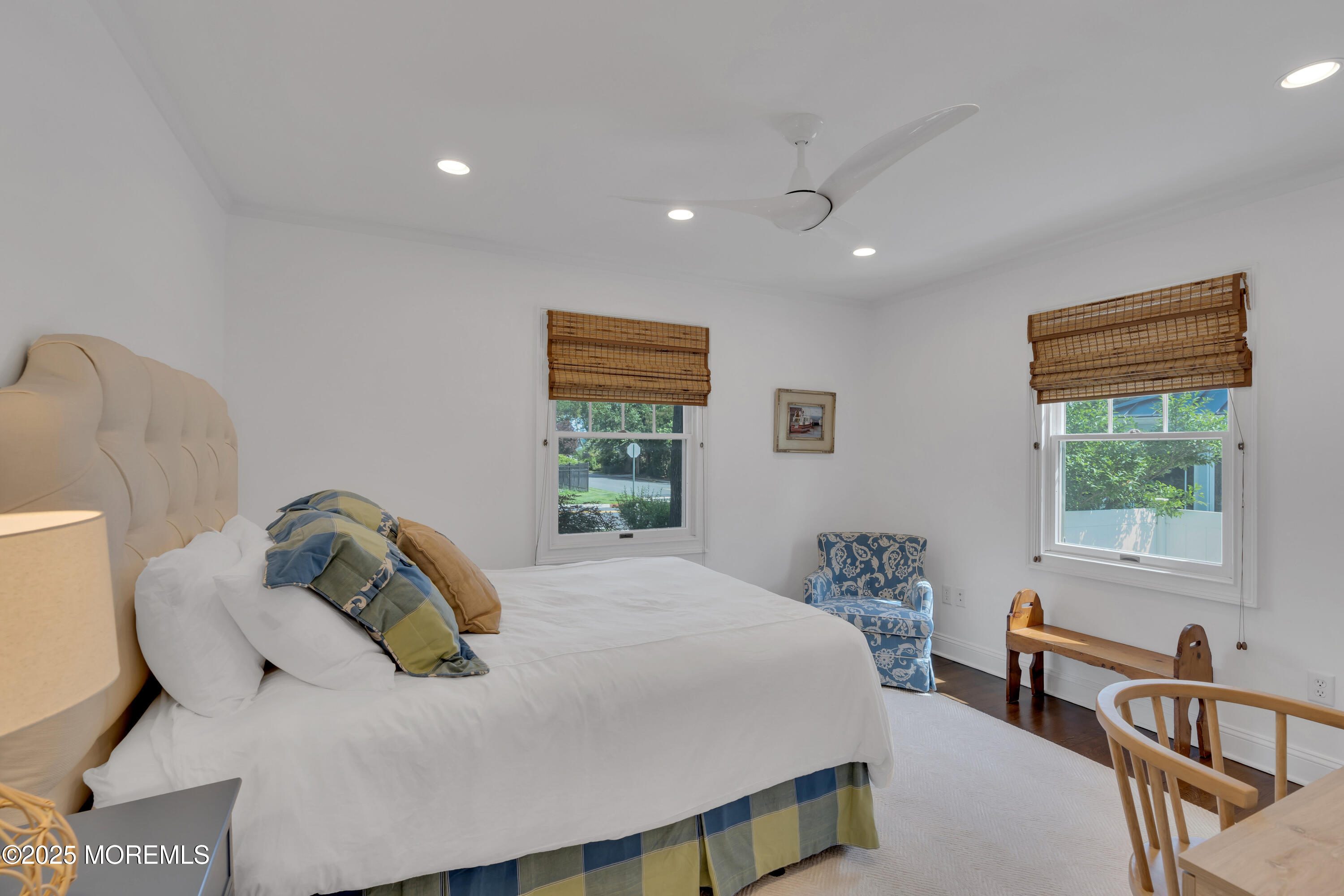 57 River Road Rumson, NJ 07760 - Photo 24 of 44 a bedroom with a bed and window