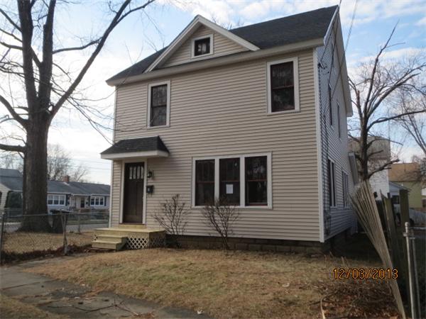 48 St James Circle Springfield, MA 01104 - Photo 1 of 8 a front view of a house with a yard