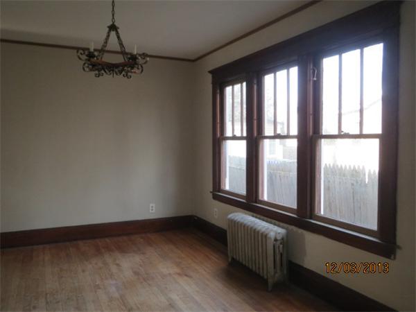 48 St James Circle Springfield, MA 01104 - Photo 3 of 8 a view of an empty room with a window