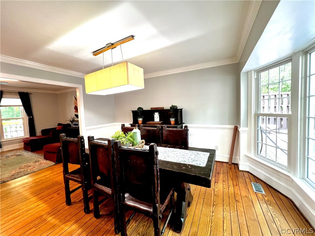 13604 Winterberry Ridge Midlothian, VA 23112 - Photo 13 of 50 a view of a dining room with furniture and wooden floor