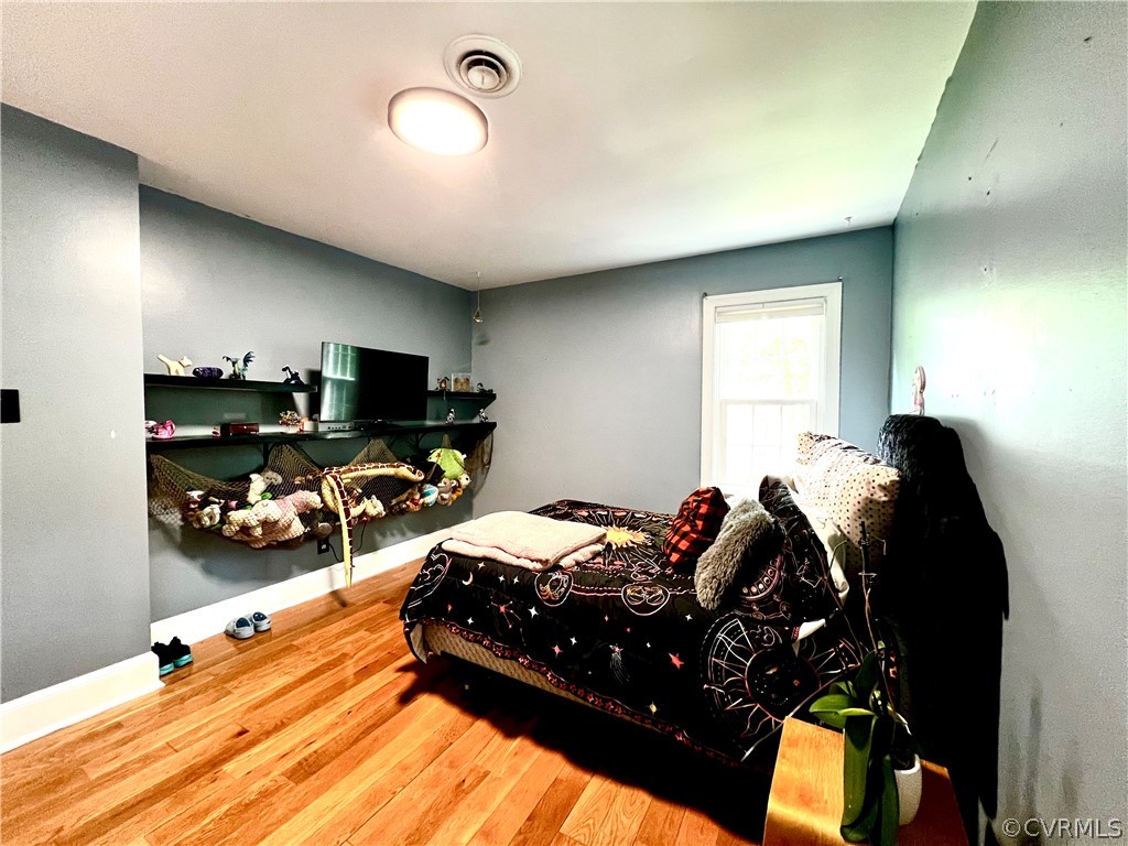 13604 Winterberry Ridge Midlothian, VA 23112 - Photo 31 of 50 a bed room with a bed and a television