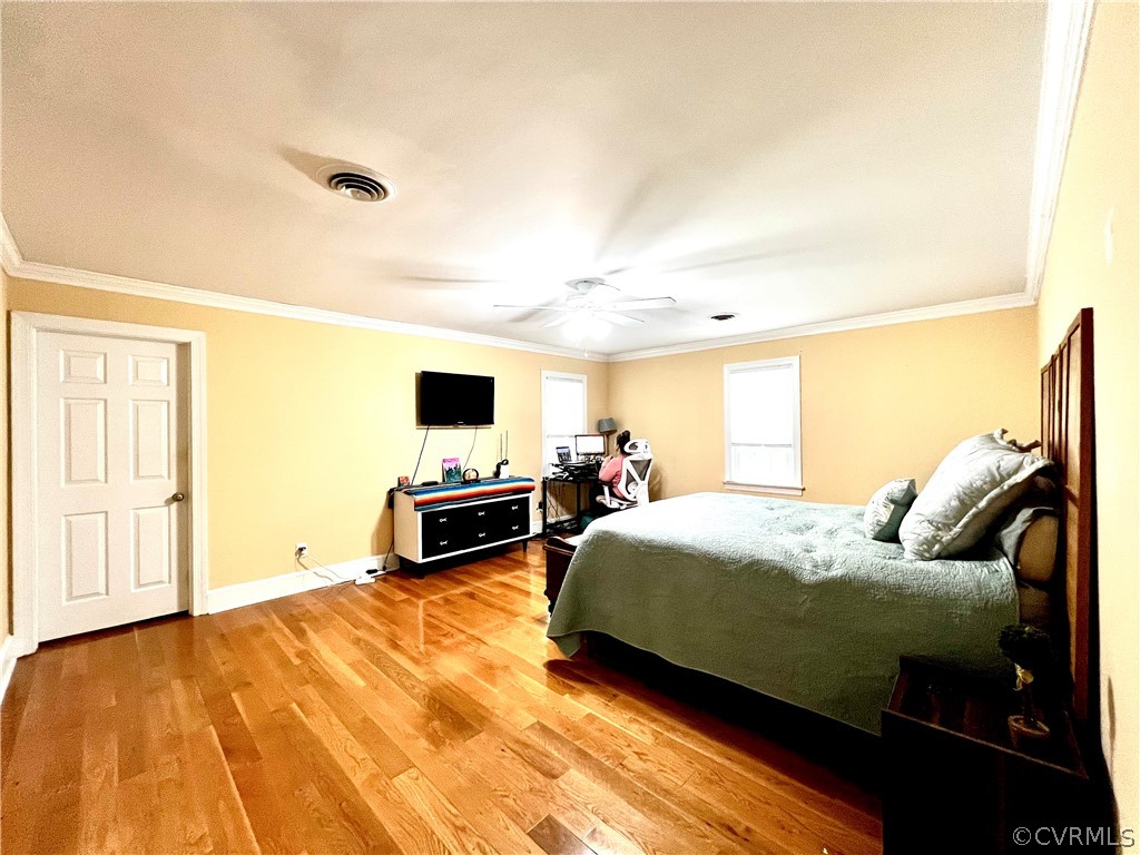 13604 Winterberry Ridge Midlothian, VA 23112 - Photo 36 of 50 a bedroom with a bed and flat screen tv