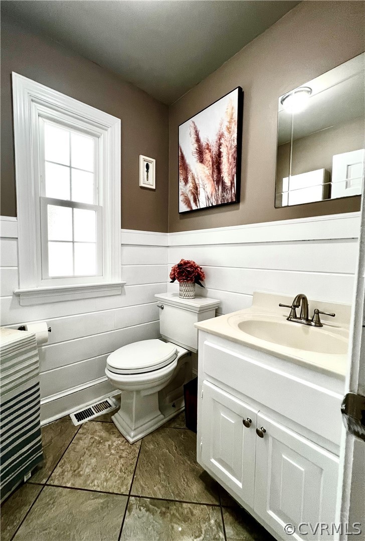13604 Winterberry Ridge Midlothian, VA 23112 - Photo 45 of 50 a bathroom with a toilet sink and mirror