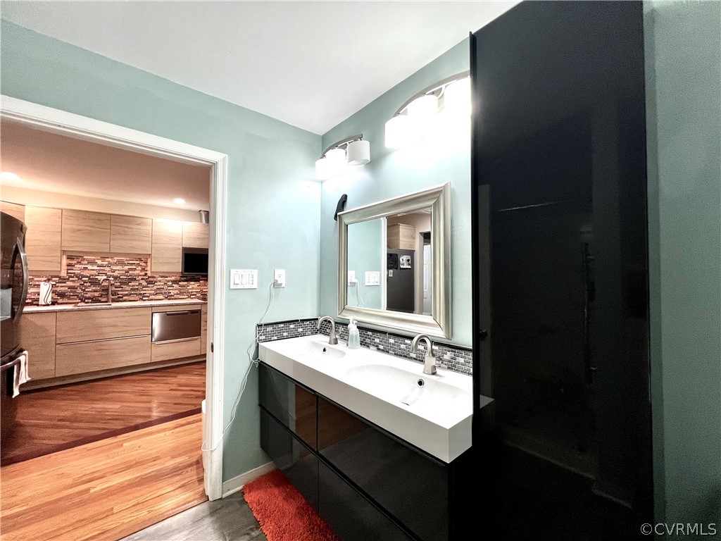 13604 Winterberry Ridge Midlothian, VA 23112 - Photo 46 of 50 a bathroom with a sink and a mirror