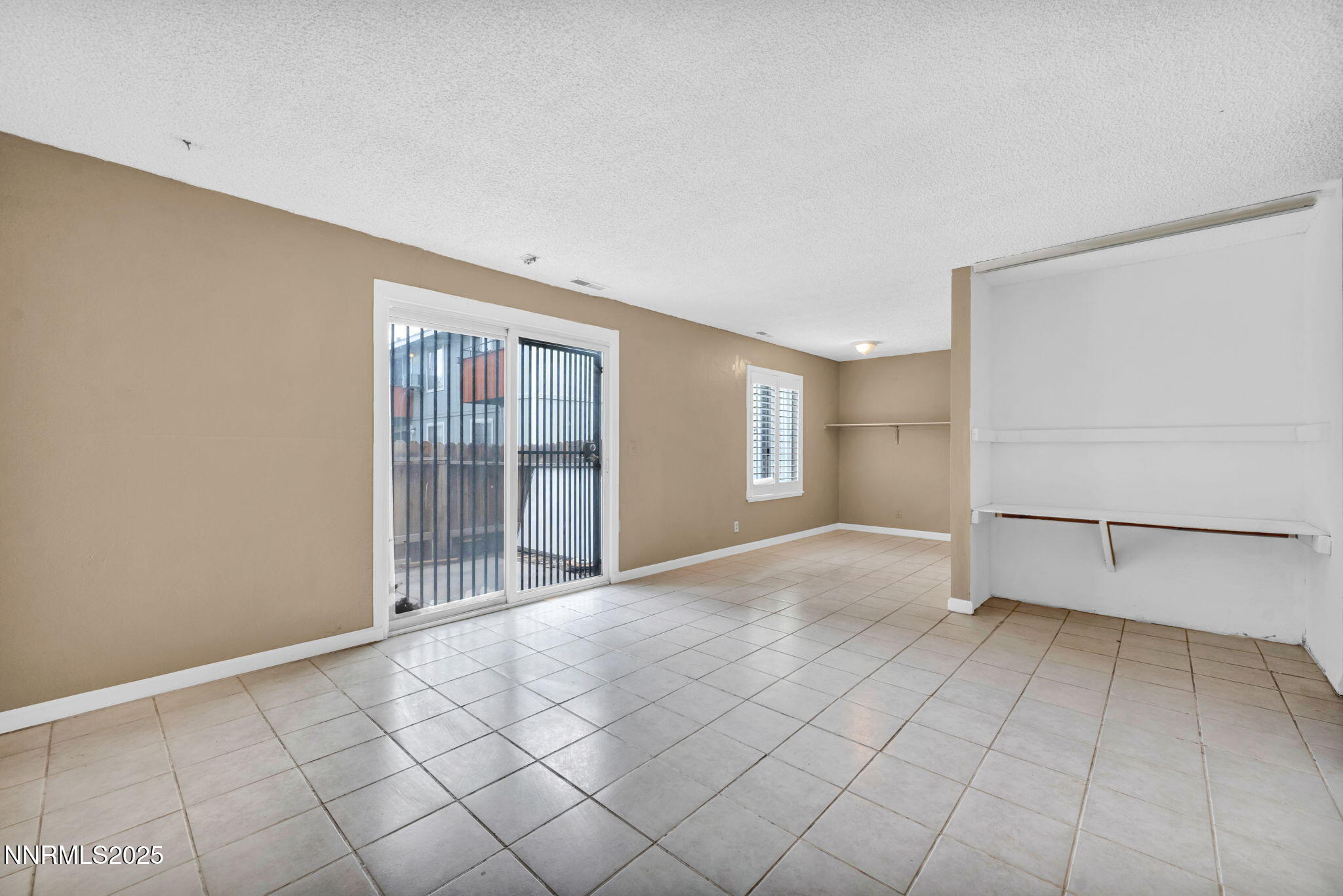 4600 Neil Road, Unit 35 Reno, NV 89502 - Photo 7 of 23 a view of an empty room with a window