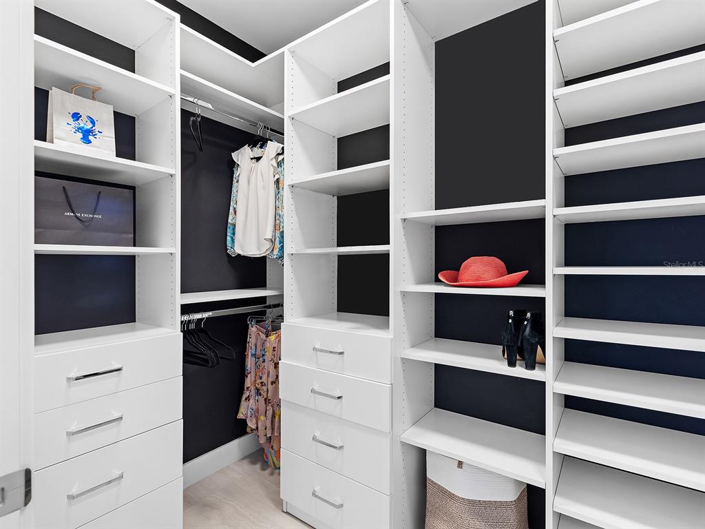 301 Quay Commons, Unit 509 Sarasota, FL 34236 - Photo 15 of 45 a view of walk in closet