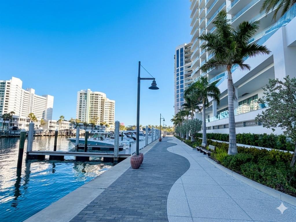 301 Quay Commons, Unit 509 Sarasota, FL 34236 - Photo 45 of 45 a view of a terrace with seating space and potted plants