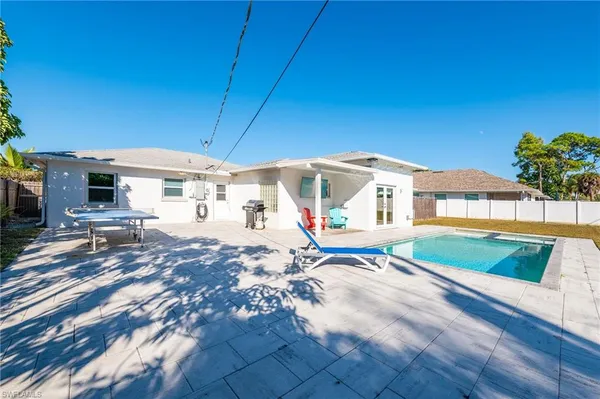 a view of a house with swimming pool