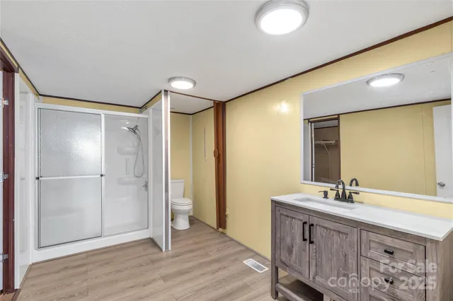 a view of livingroom with an empty space and a window